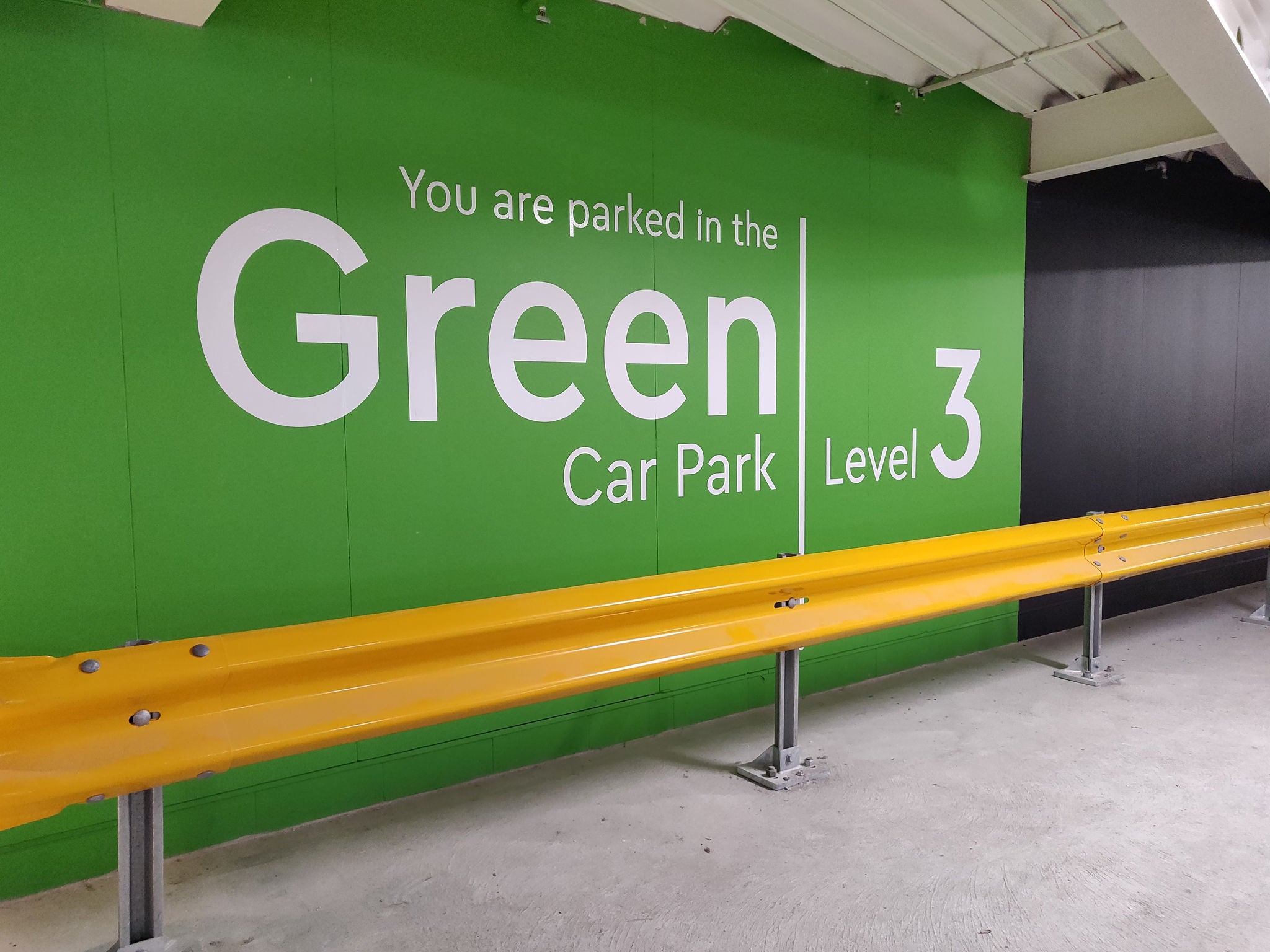 In addition to having numbered car parks, colour coding different parking levels can assist people to remember where they have parked. 