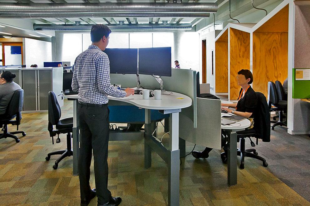 This desk can be adjusted for personal use while sitting or standing. Everybody works differently, so it's important that office spaces are flexible to accommodate for individual working preferences.