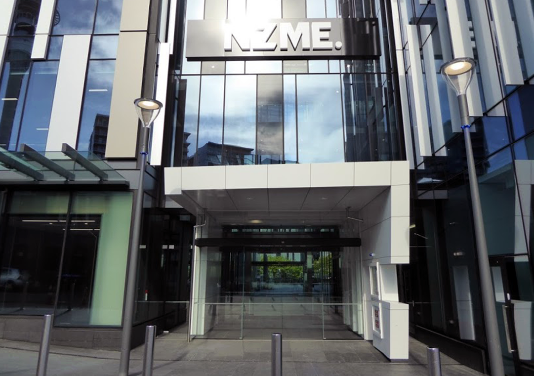 This entrance is recessed within the building, with a large canopy overhanging the approach allowing people to shelter or wait in inclement weather.