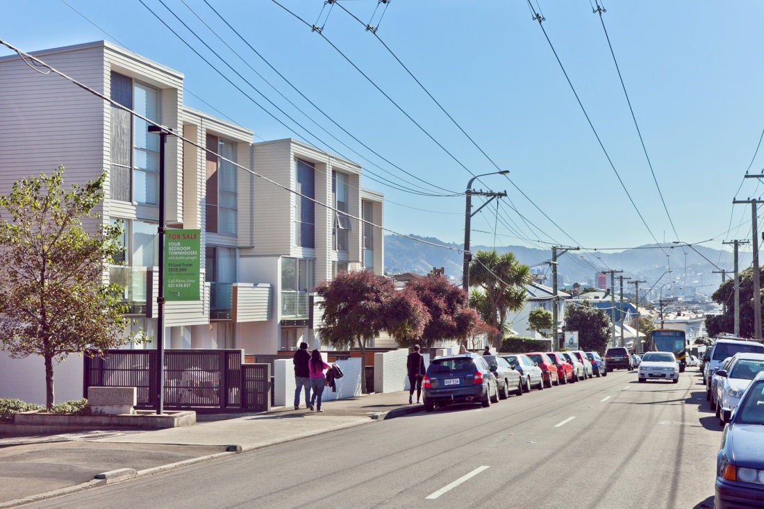 High density terrace housing development in a central city environment that creates an excellent edge to the street while accommodating the car via rear lane access.