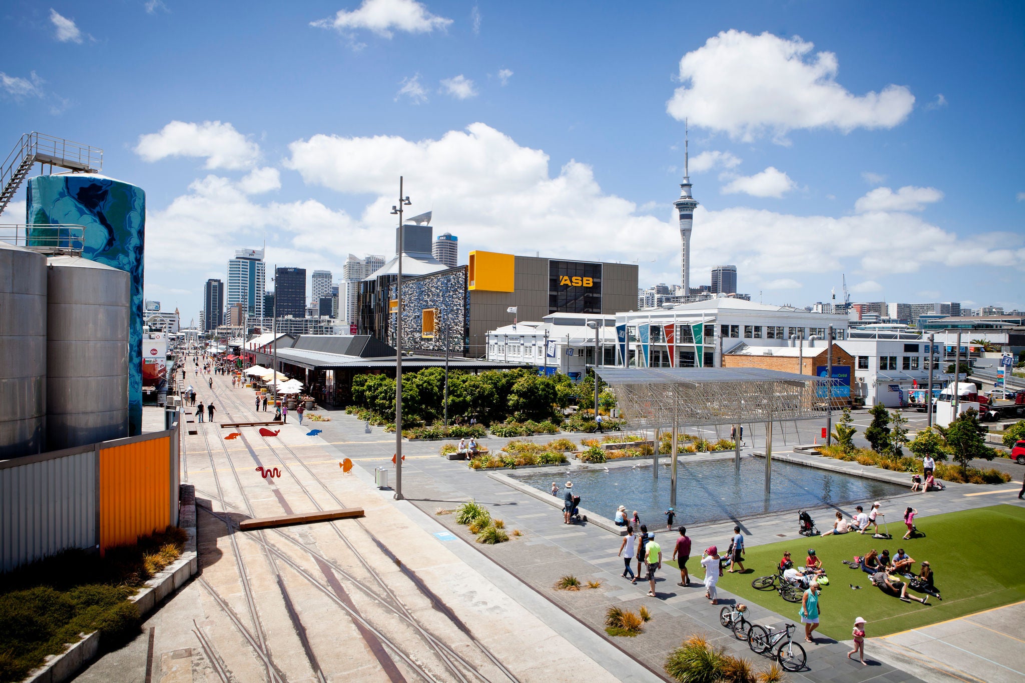 View from the 2nd floor walk up over the North wharf walkway, fountain and basket ball court